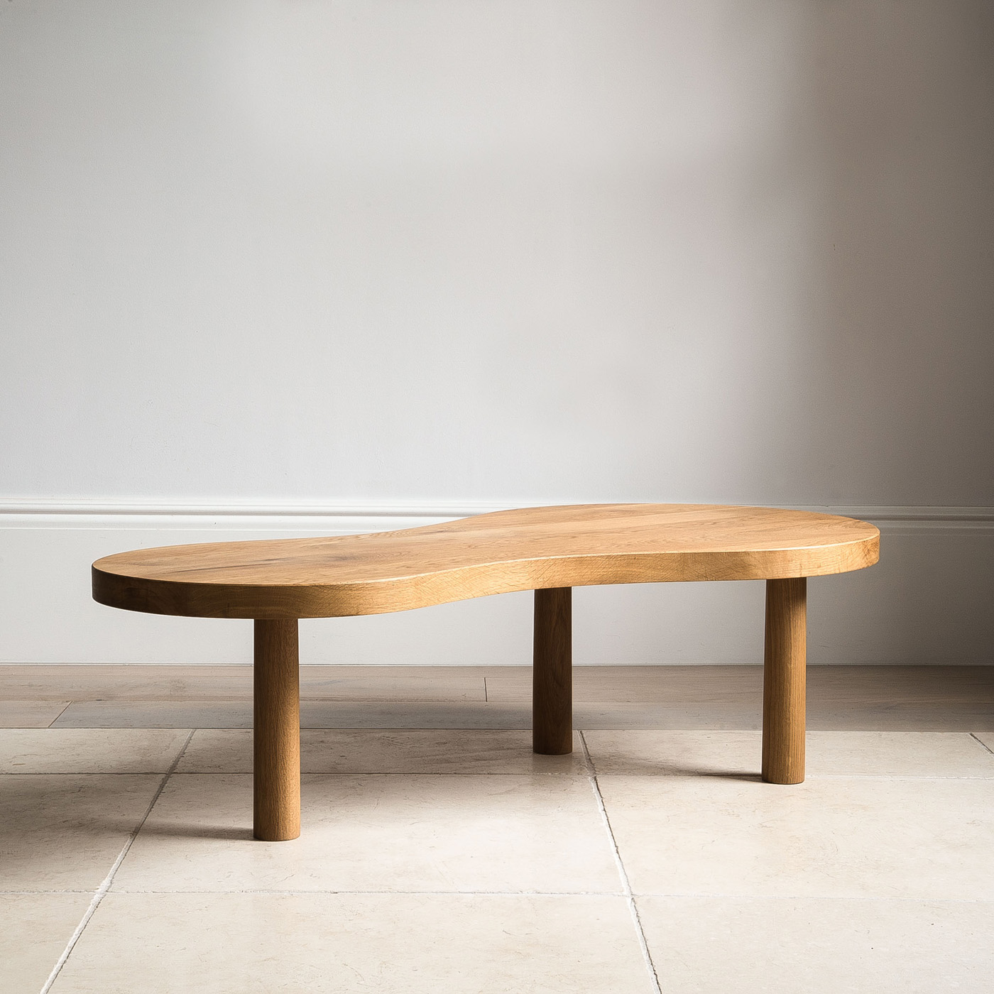 The Goldfinger x Inhabit curved coffee table