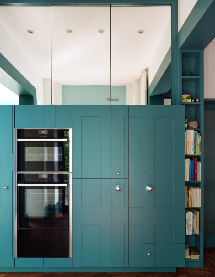 Blue cabinetry by Uncommon Projects