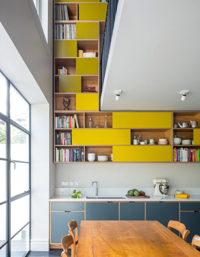 Yellow shelving by Uncommon Projects