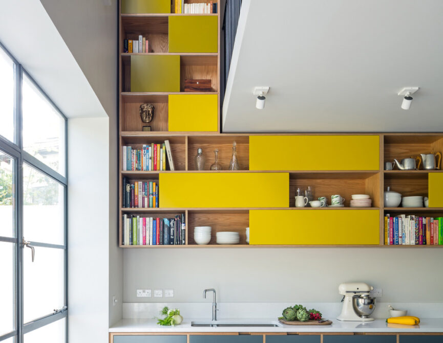 Yellow shelving by Uncommon Projects