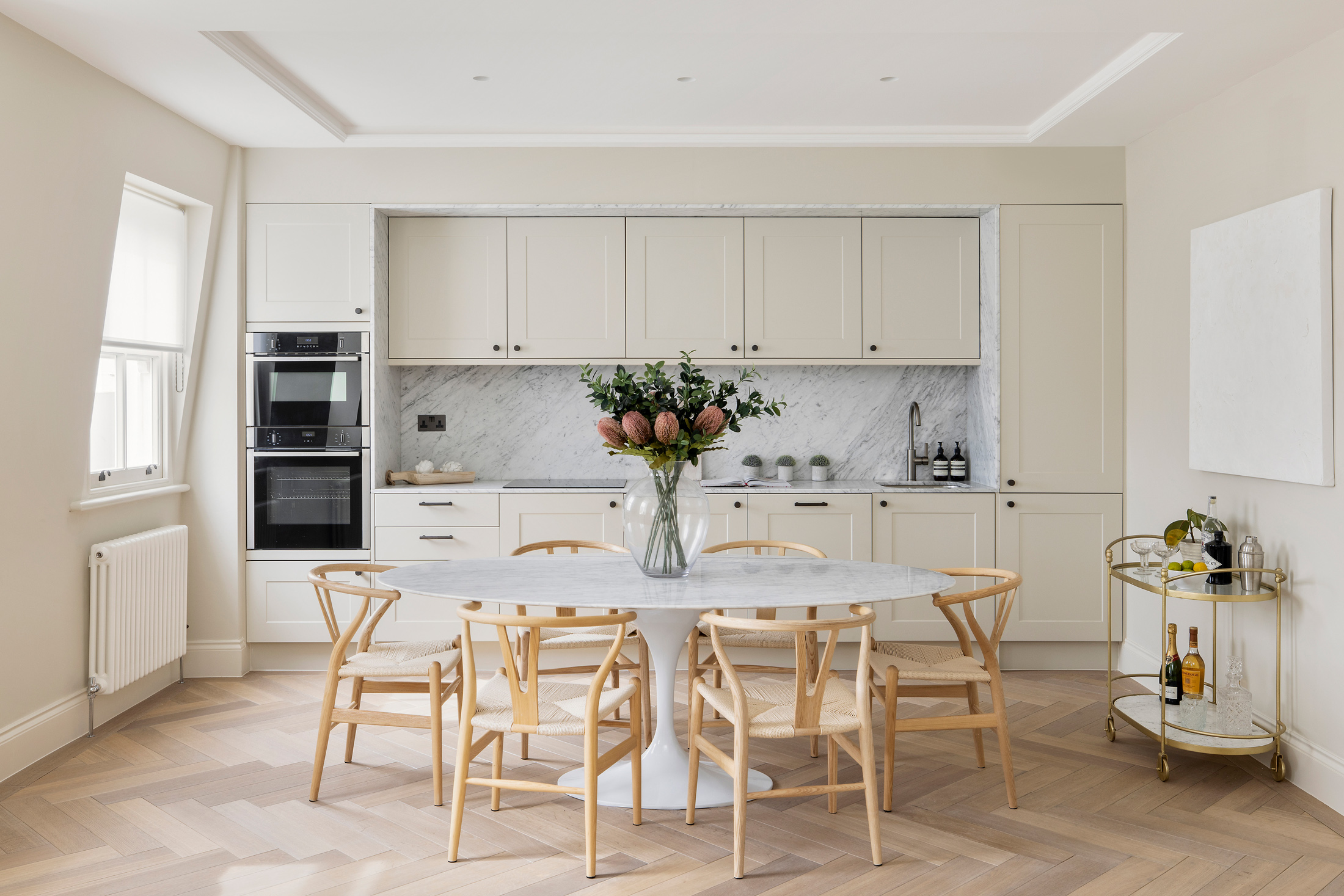 For Sale: Vicarage Gate Kensington W8 contemporary kitchen and dining room with pale parquet floors