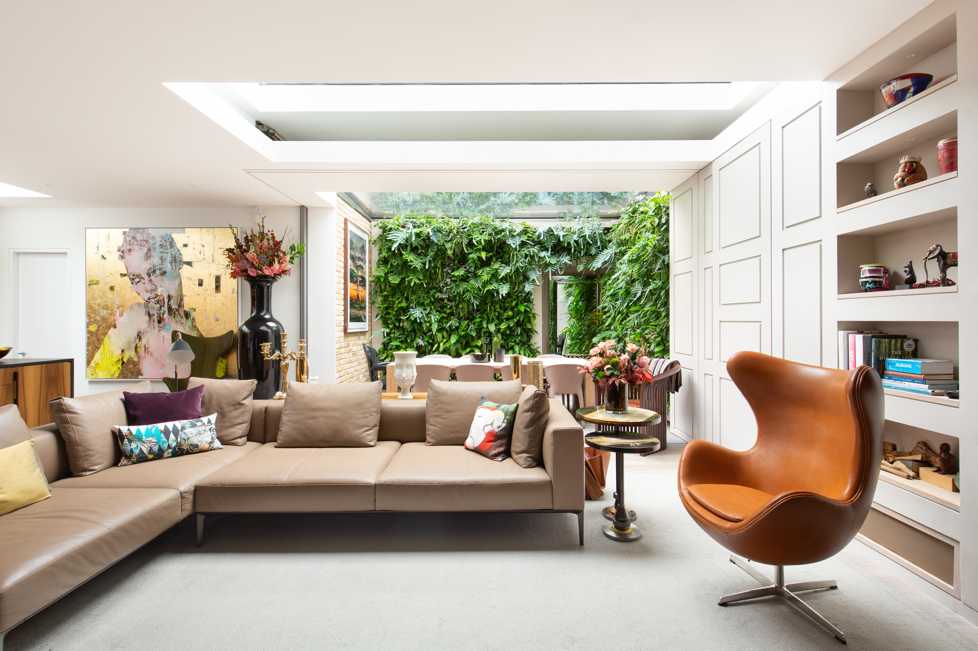For Sale: Westbourne Grove Notting Hill W2 - a family house with a luxury living room featuring skylights and an indoor garden