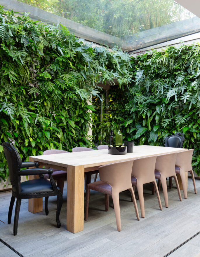Westbourne Grove's Indoor dining area with skylight and planters