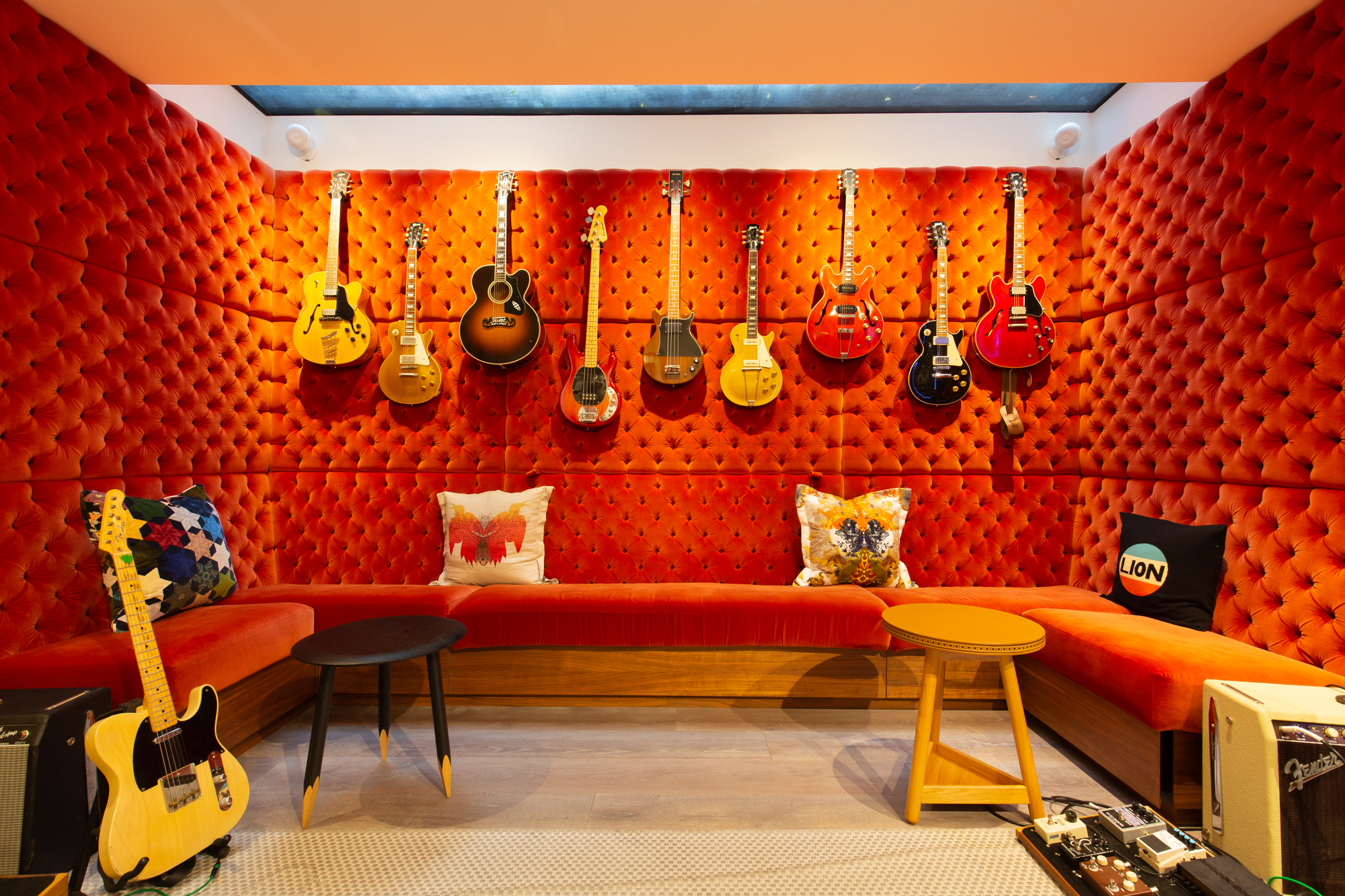 Padded recording studio with guitars in Westbourne Grove