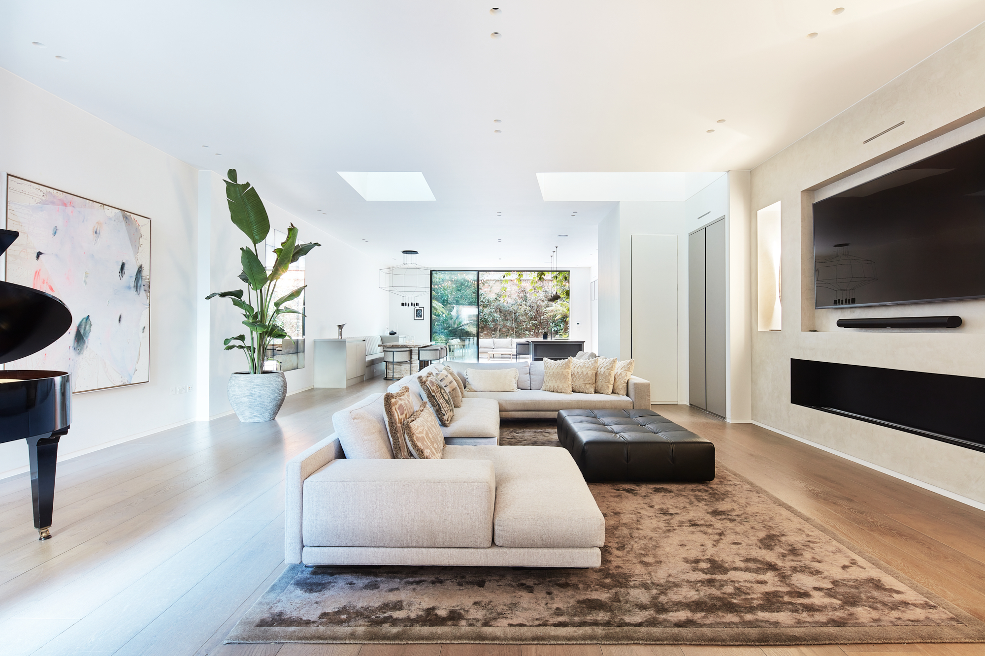 Luxury home for rent in London, Notting Hill W2 - contemporary reception room with modern furniture and skylights