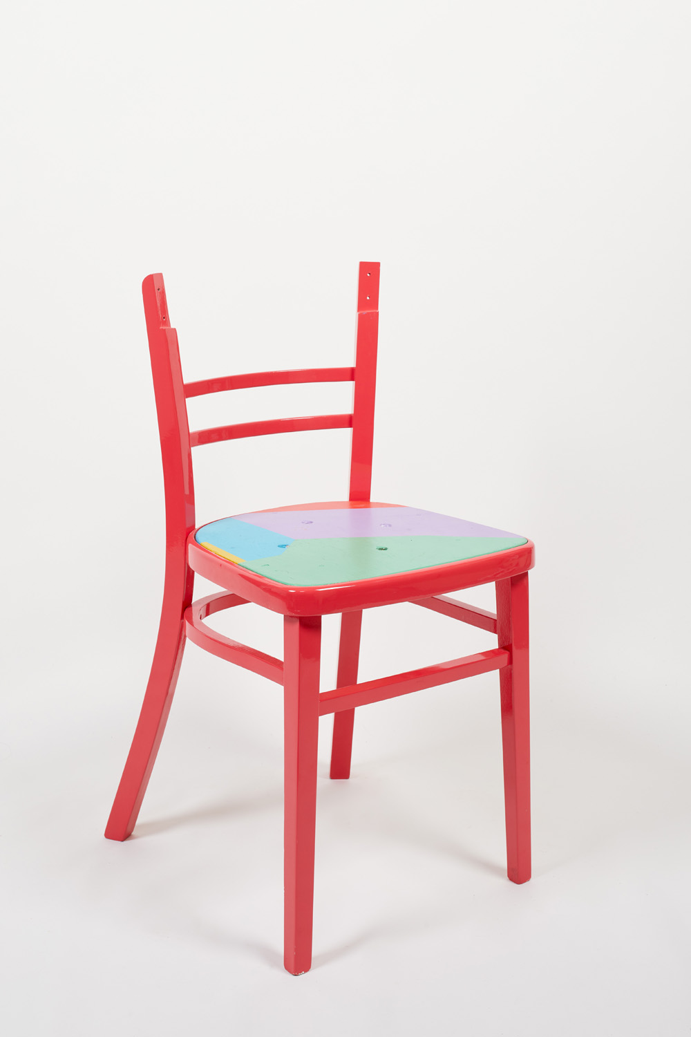 Red chair by Yinka Ilori
