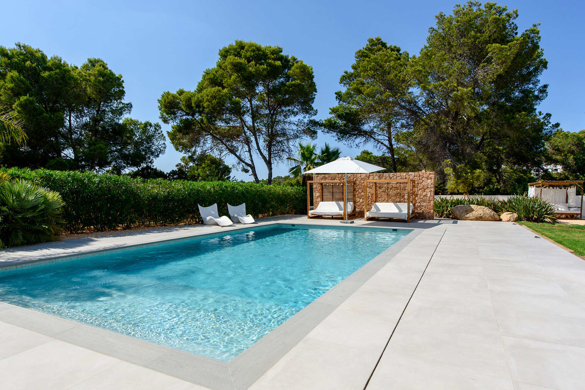 Diagonal view of a swimming pool at a luxury villa in Ibiza