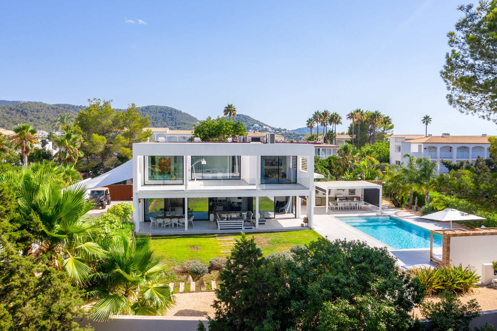 Front view of a luxury villa for sale in Ibiza